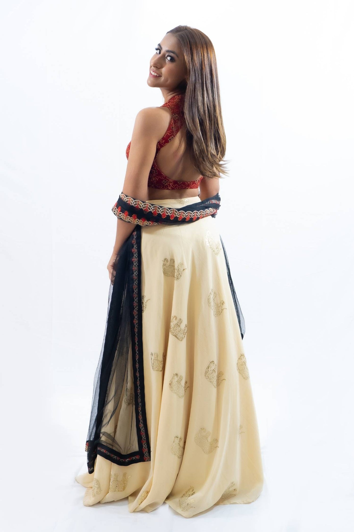 Red bowtie printed lengha with cream skirt Indian outfit rental Bangkok