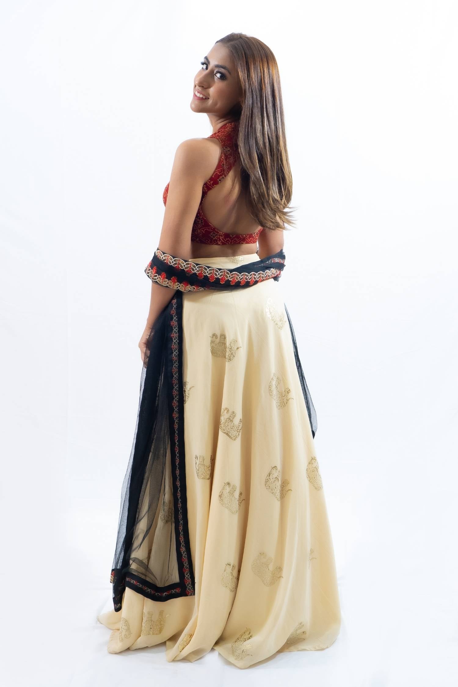 Red bowtie printed lengha with cream skirt Indian outfit rental Bangkok