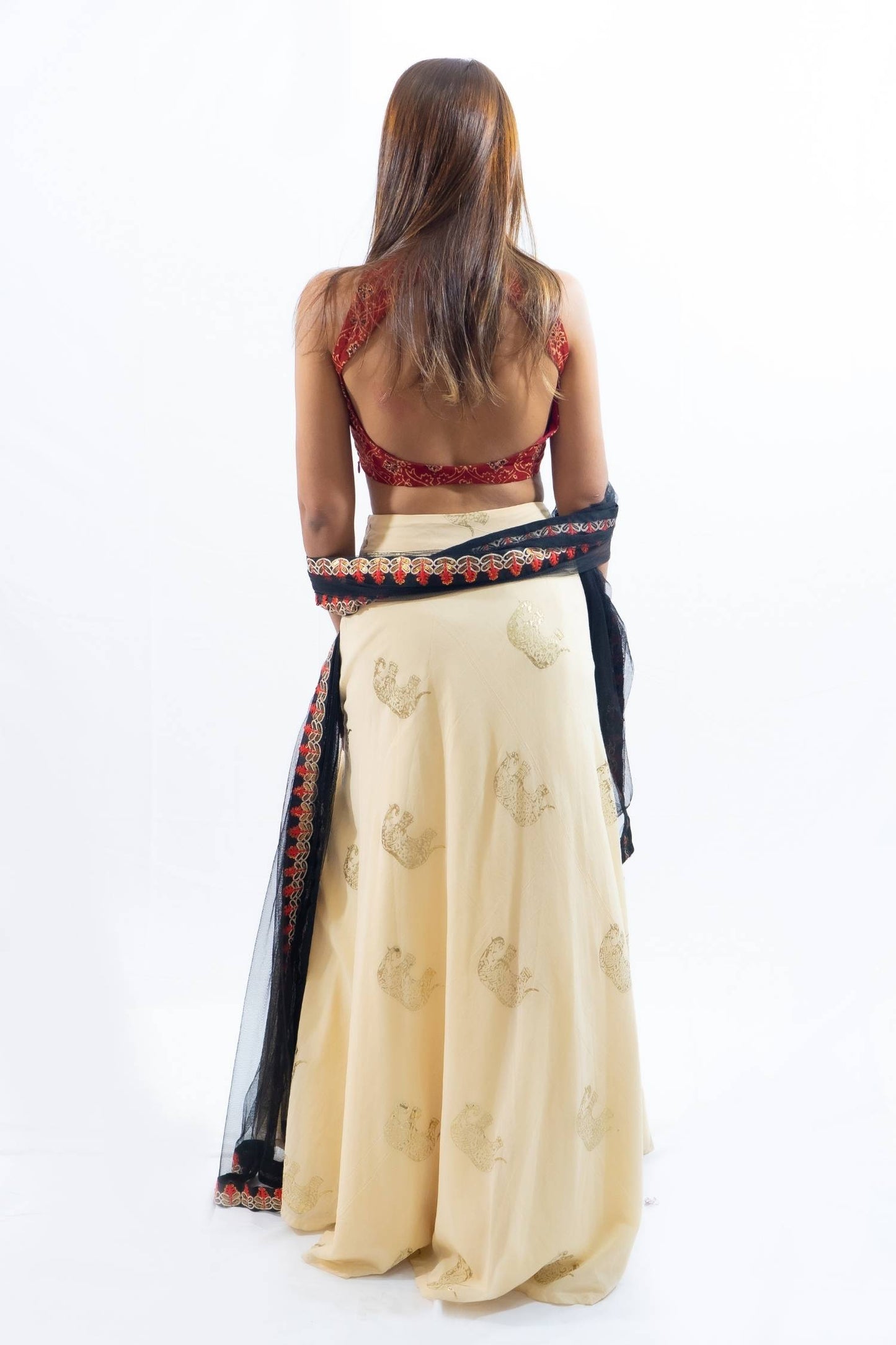 Red bowtie printed lengha with cream skirt Indian outfit rental Bangkok