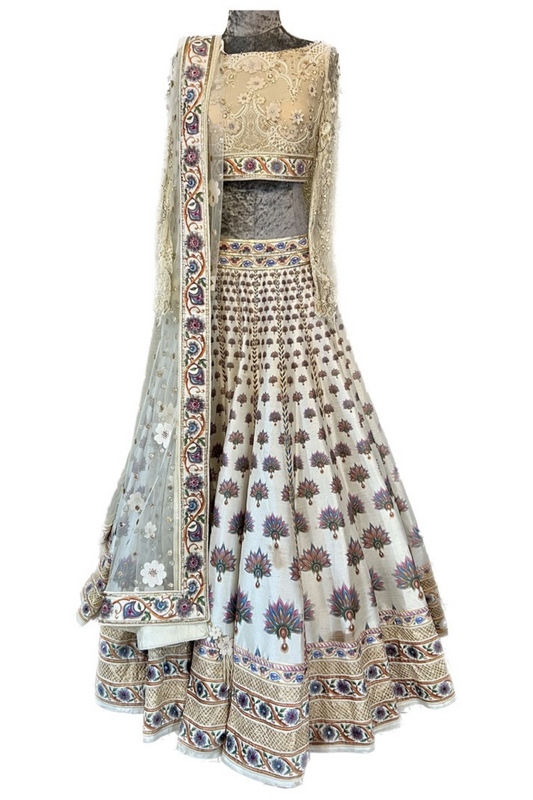 Gold and white lengha by Tarun Tahiliani