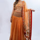 Orange and gold detail lengha Indian outfit rental in Bangkok